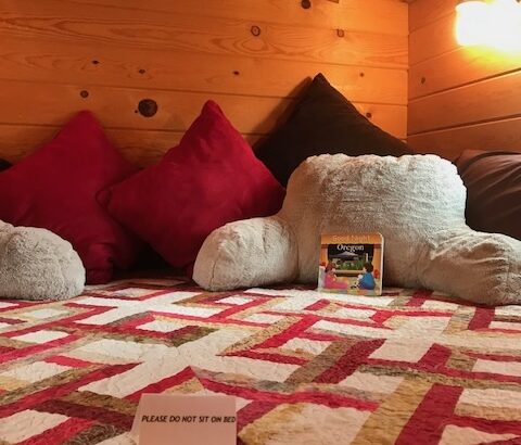 A bed in one of the tiny homes in the Tiny Digs Hotel in Portland Oregon