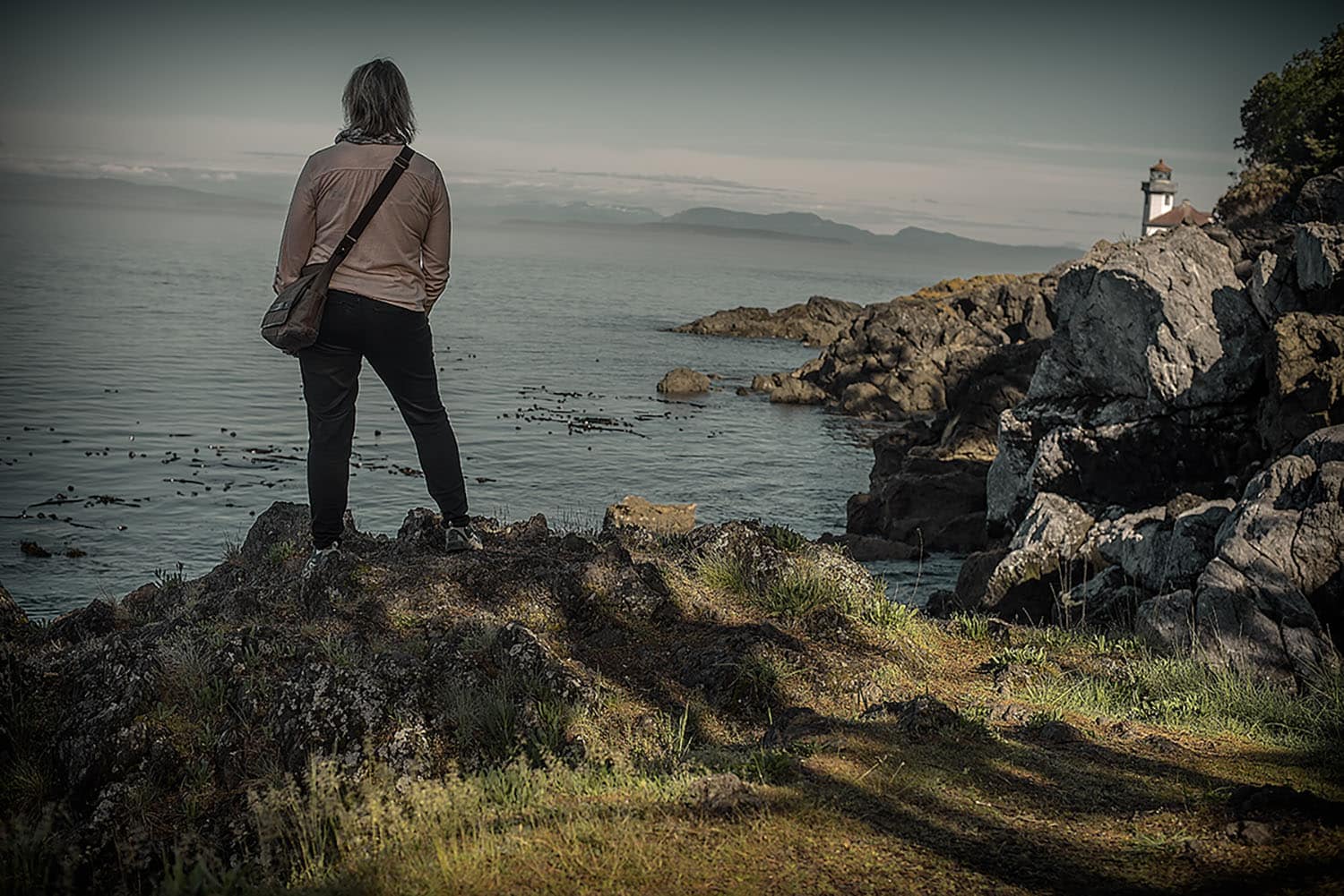 Explorer Sue on San Juan Island looking out at the Strait of Juan de Fuca