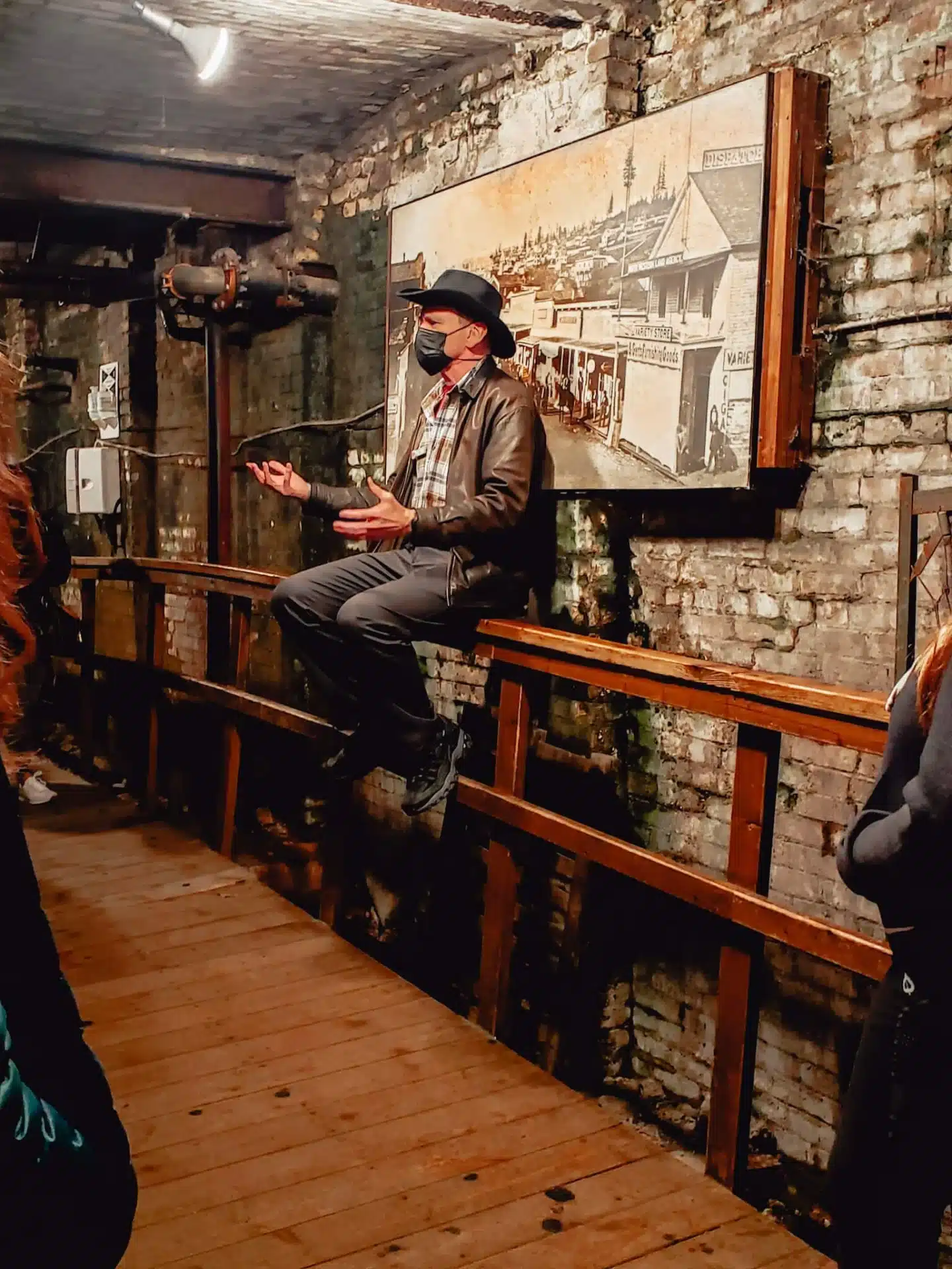 A tour guide giving an Seattle Underground Tour.