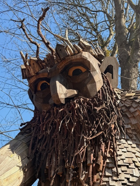 A close up of Oscar the Bird King troll on Vashon Island, Washington.